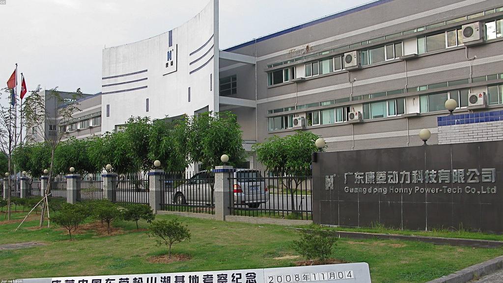 Custom rubber molding press and precision engineered rubber components in an industrial facility